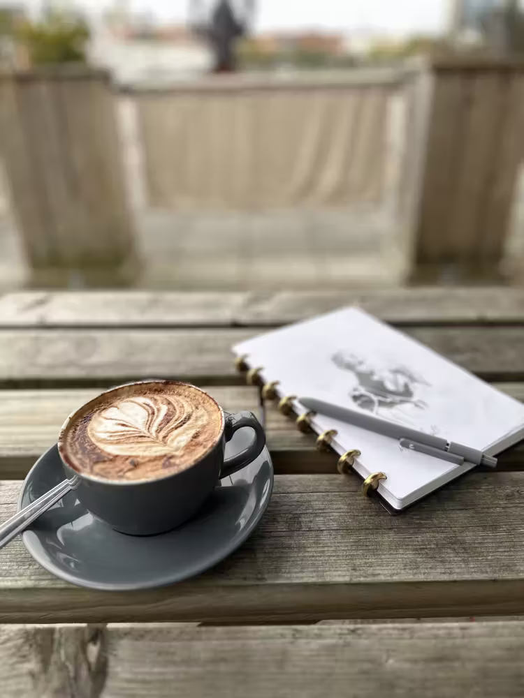 A latte and a sketchbook