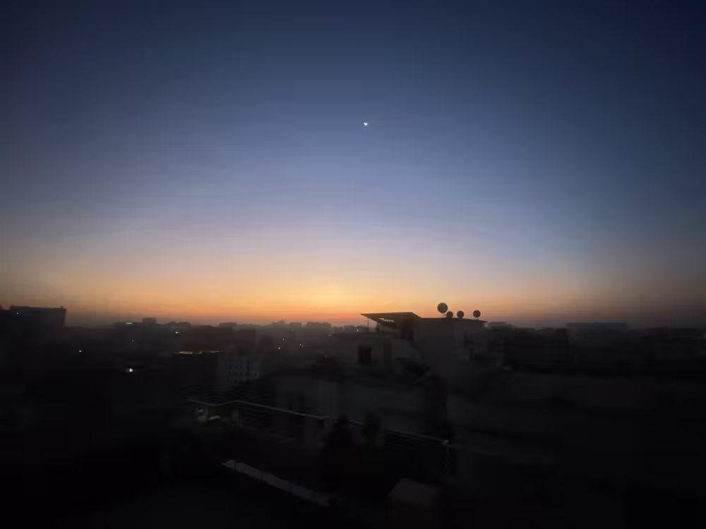 First light along the horizon, one star still out