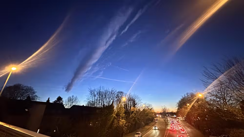 Dusk sky over a busy road