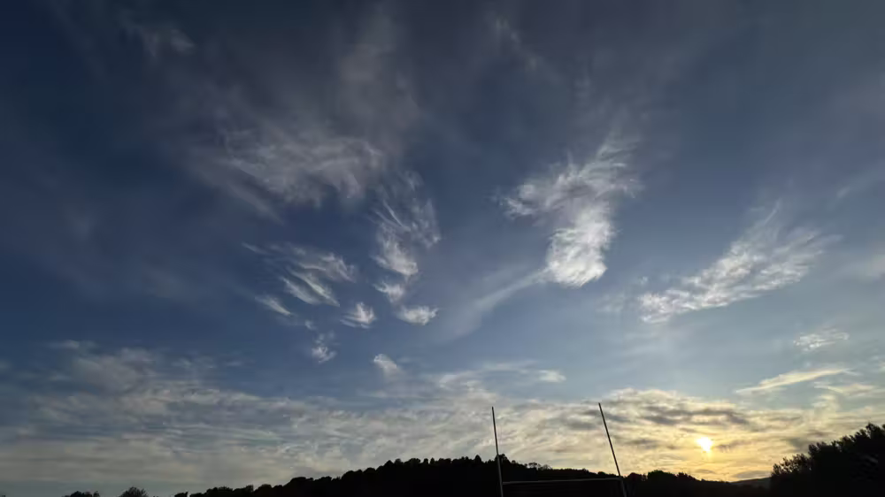 Wispy clouds at sunset