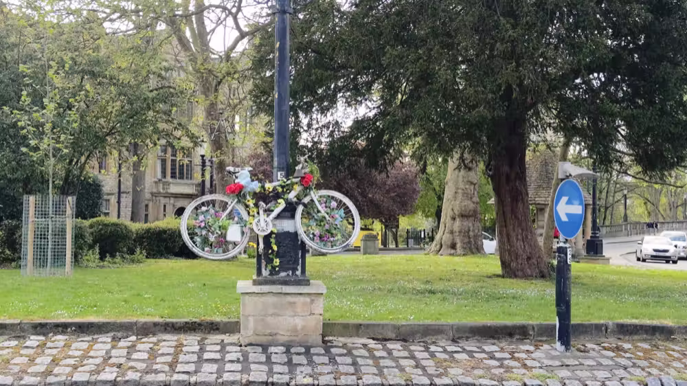 Ghost bike with flowers
