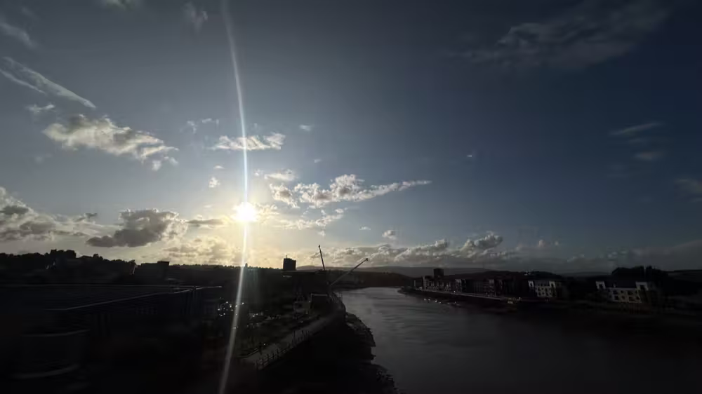 Sun flare over the river