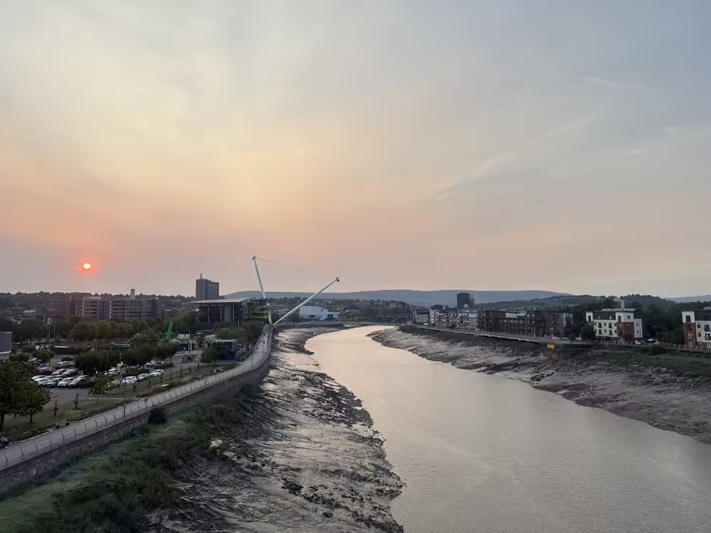 Sunset over the river at low tide