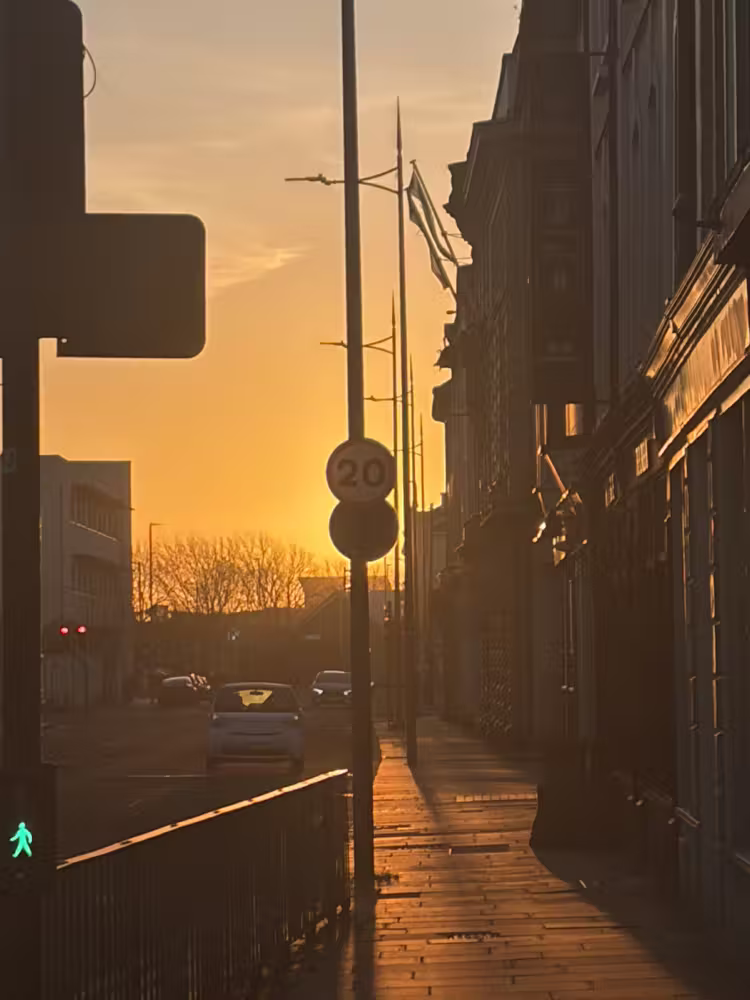 Low sun down a street